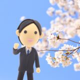 自筆証書遺言の相談をイメージした行政書士と桜のイラスト